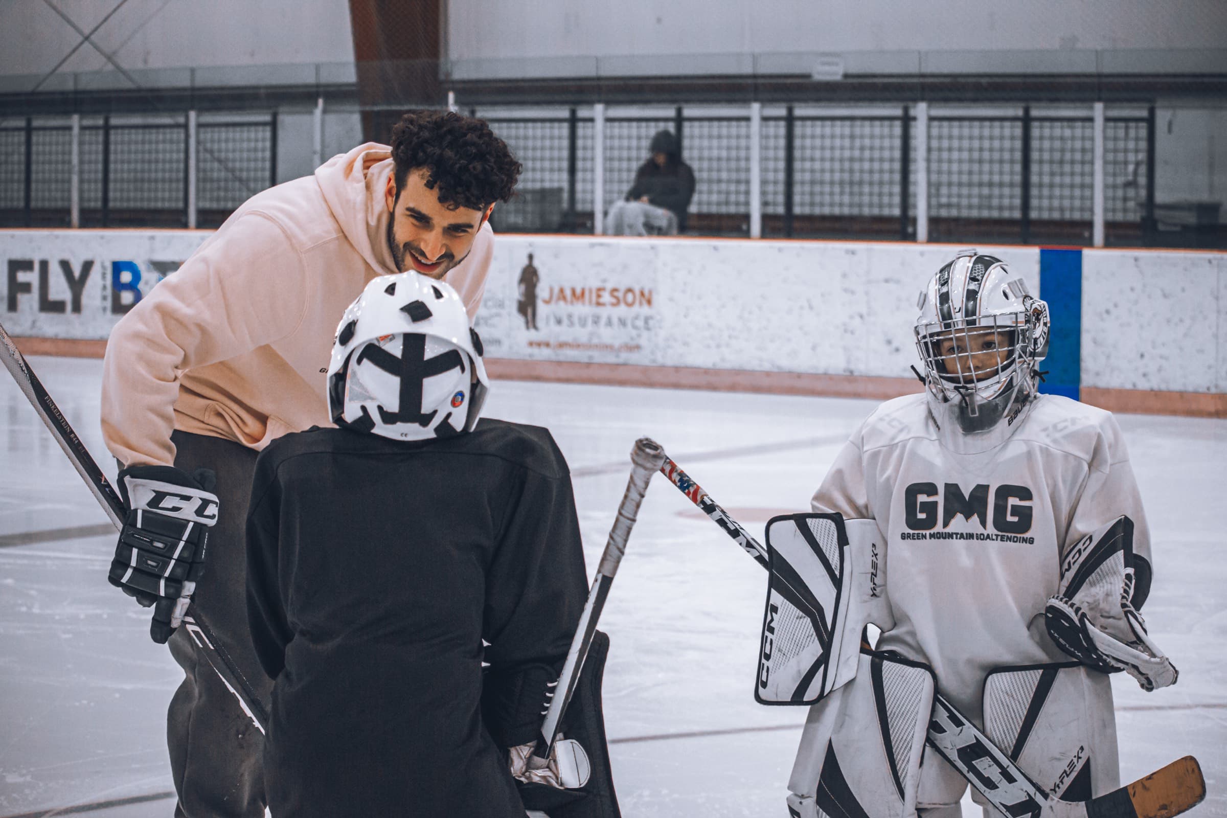 Shea Spanier coaching young goalies