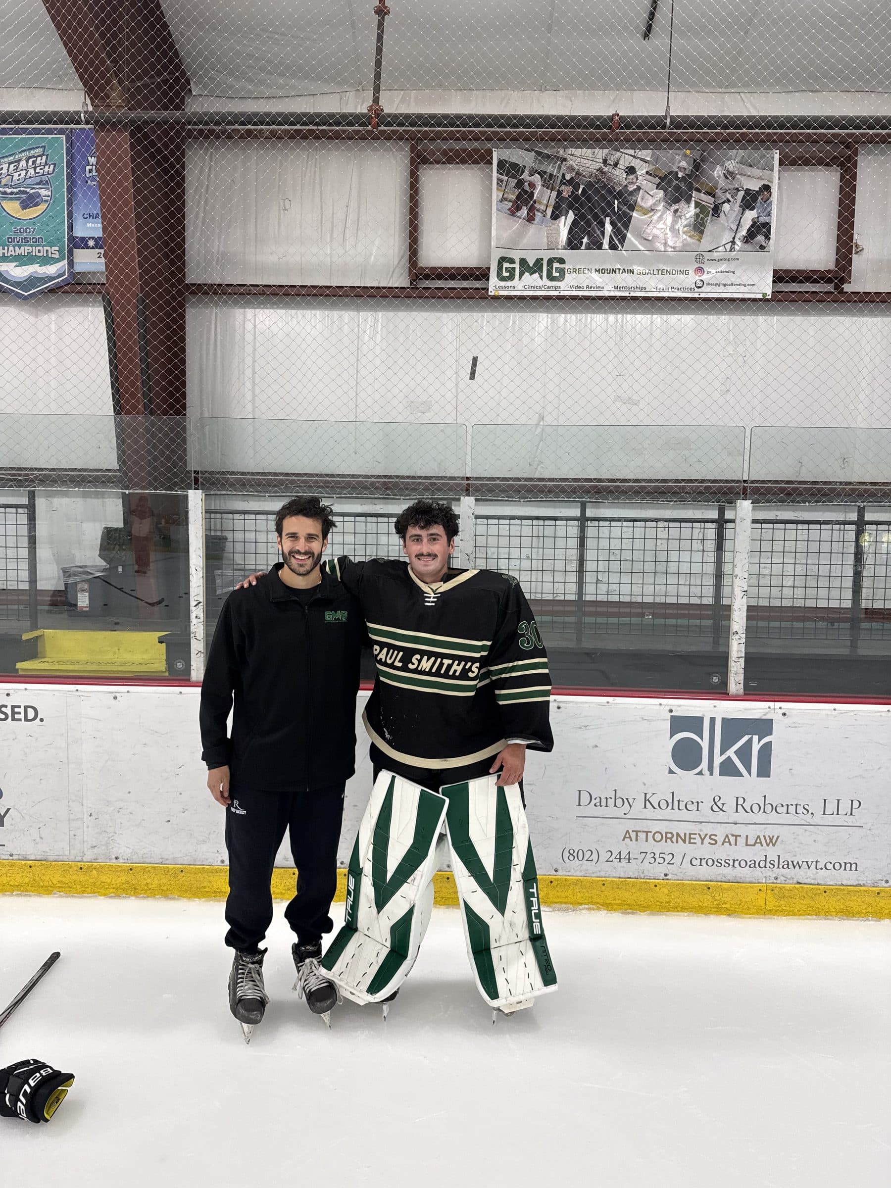 Shea Spanier with a college goalie after a session